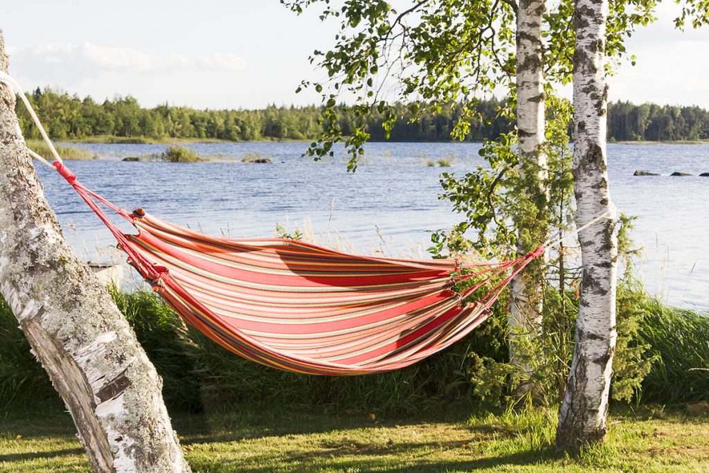 Hammocks are cooler than tents for comfortable summer camping.