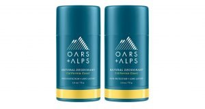 Oars + Alps Natural Deodorant blue container with white lettering.