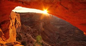 Sunrise through the Mesa Arch in the Canyonlands National Park